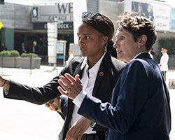 Two Special Agents discussing protective operations.