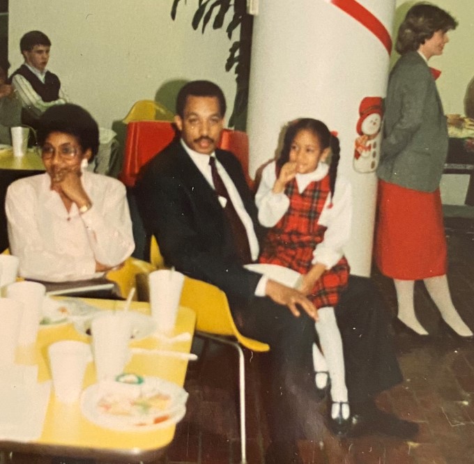 Division Chief Danielle Davis Watson with her father Special Agent Thomas Davis Jr. at the Baltimore Field Office holiday party in the late 1980s. 