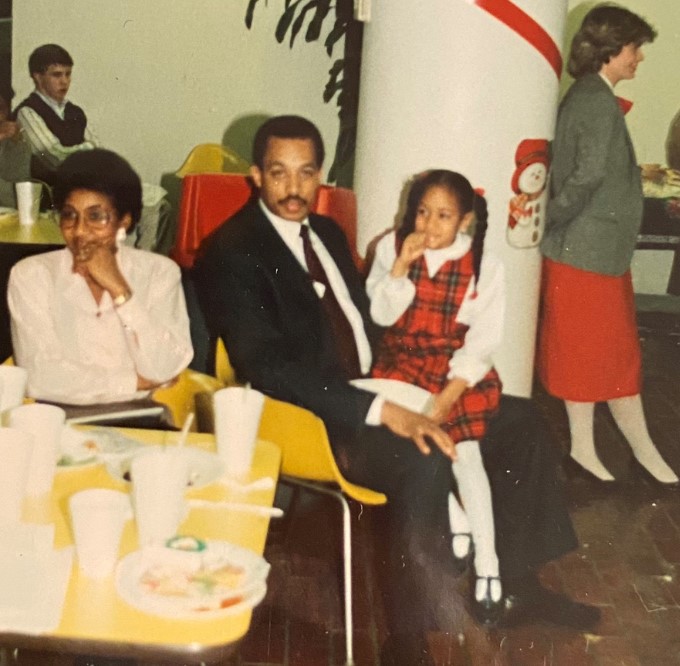 Division Chief Danielle Davis Watson with her father Special Agent Thomas Davis Jr. at the Baltimore Field Office holiday party in the late 1980s.