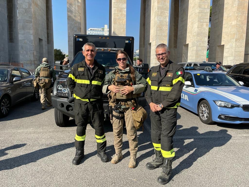 McKenzie stands with foreign counterparts in Rome, Italy.