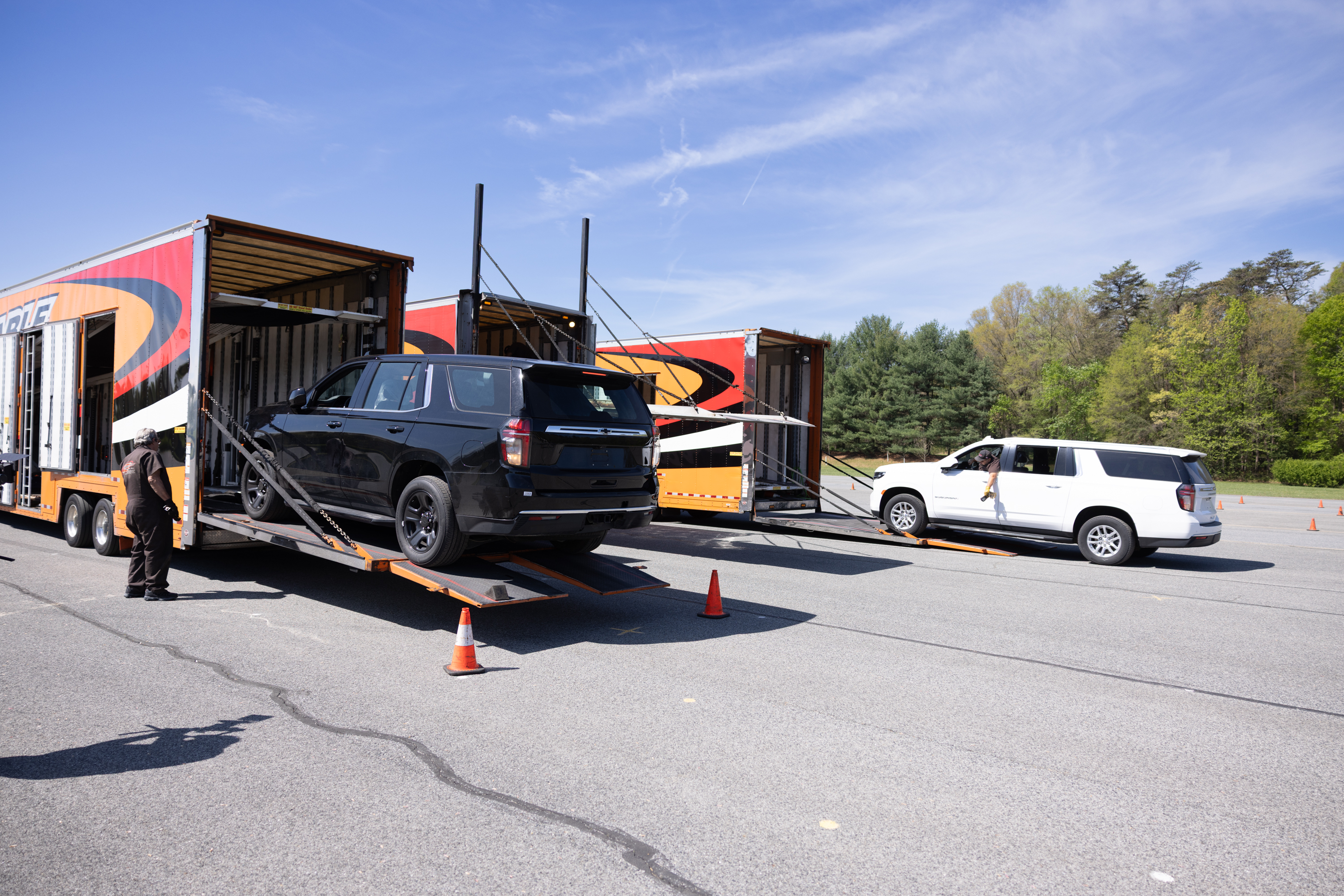 Vehicles are being unloaded at James J. Rowley Training Center.