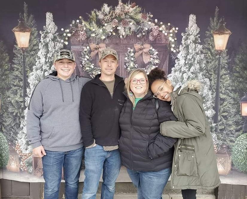 The Boettler family (left to right): Evan, Brad, Kari and Sikenan.