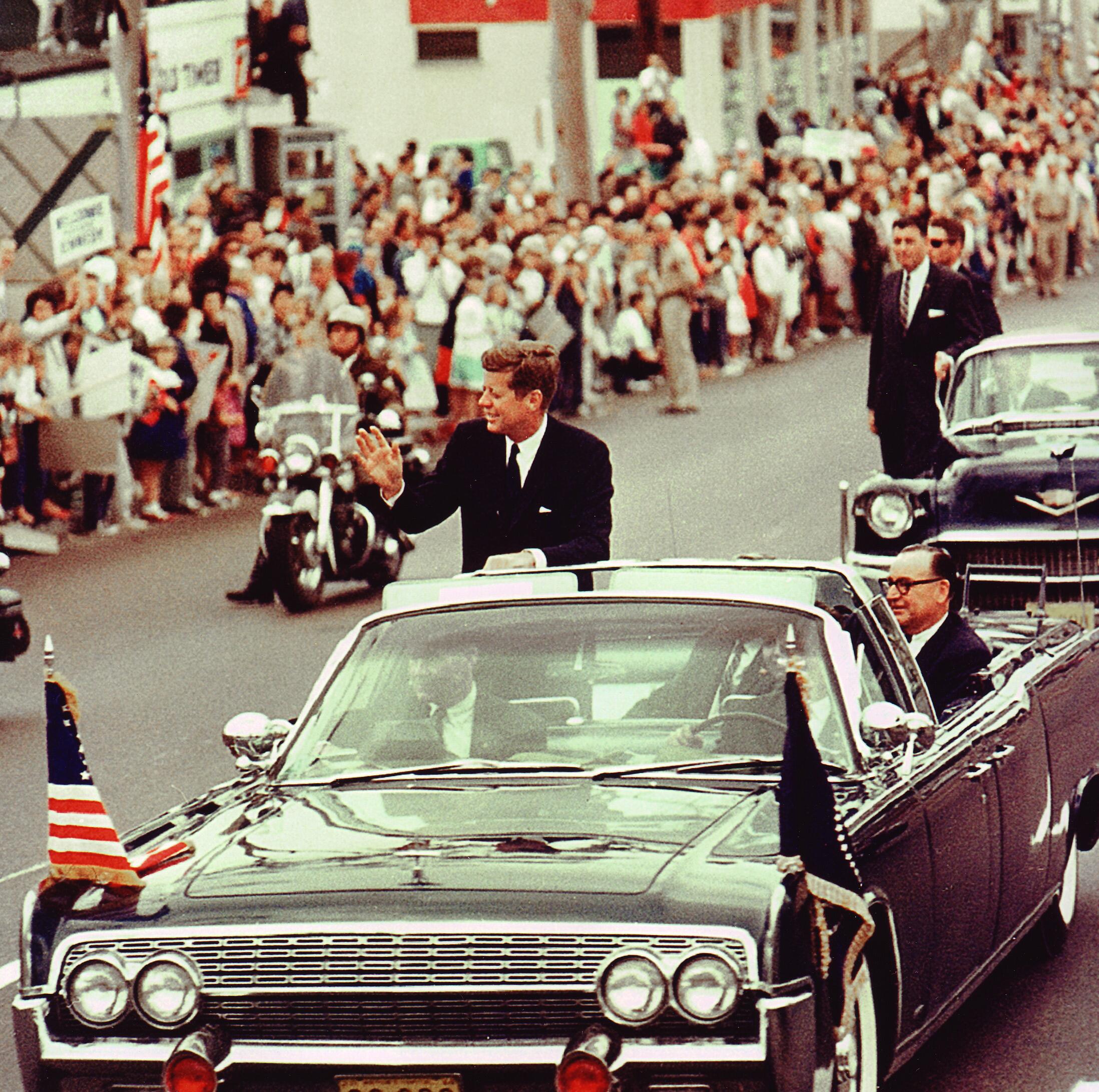 President John F. Kennedy traveled in his 1961 Lincoln Continental Limousine during a visit to San Diego, California on June 6, 1963. The limousine included a series of removable steel and transparent plastic roof panels that could be installed in various combinations. It also contained a hydraulically operated seat, which could be raised 10 ½ inches to give the gathered crowds a better view of President Kennedy and his fellow passengers. After President Kennedy's assassination in 1963, the entire vehicle was armored and returned to the Secret Service in May 1964. The finished product weighed about one ton more than the original weight of 7,800 pounds.