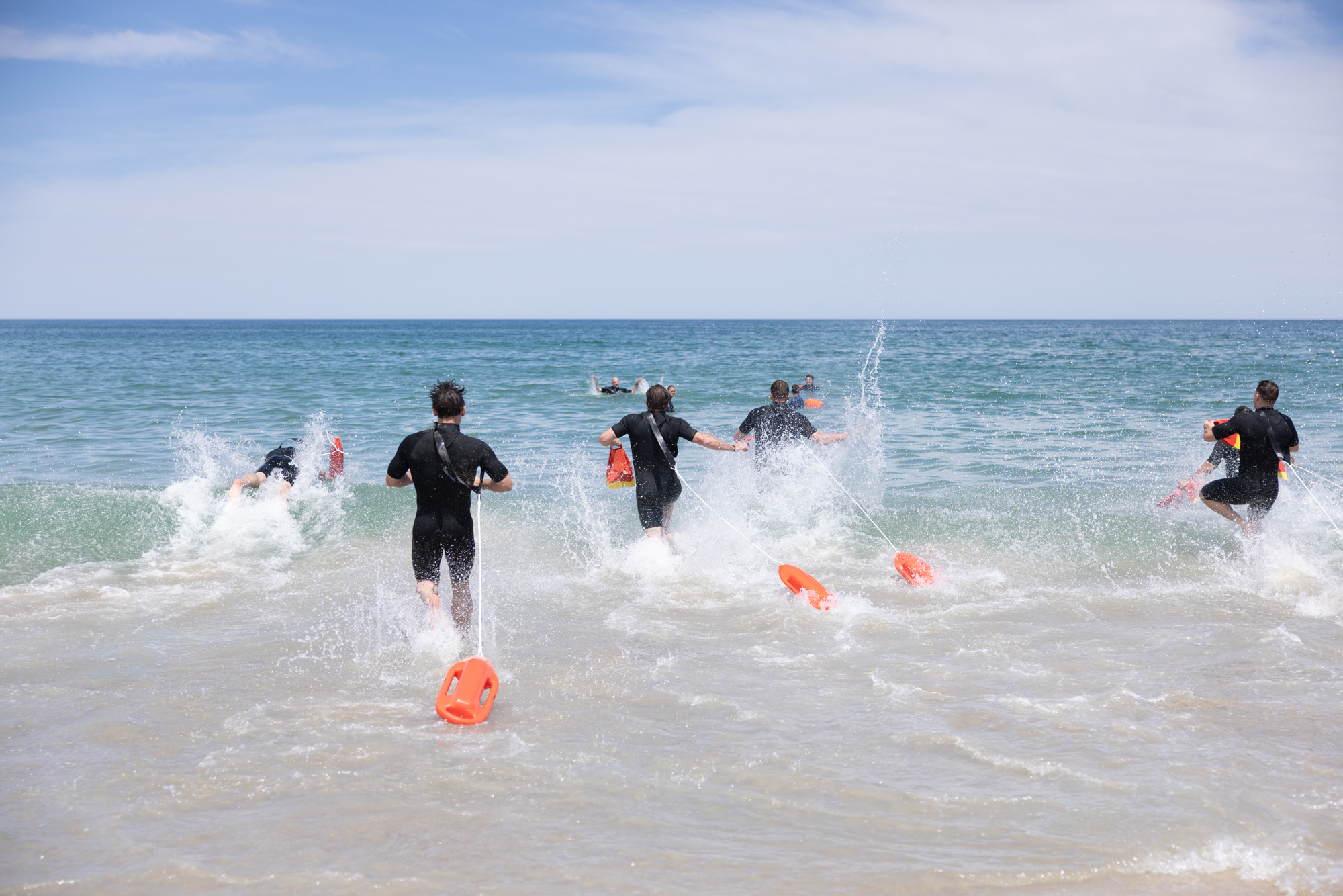 Agents entering the water