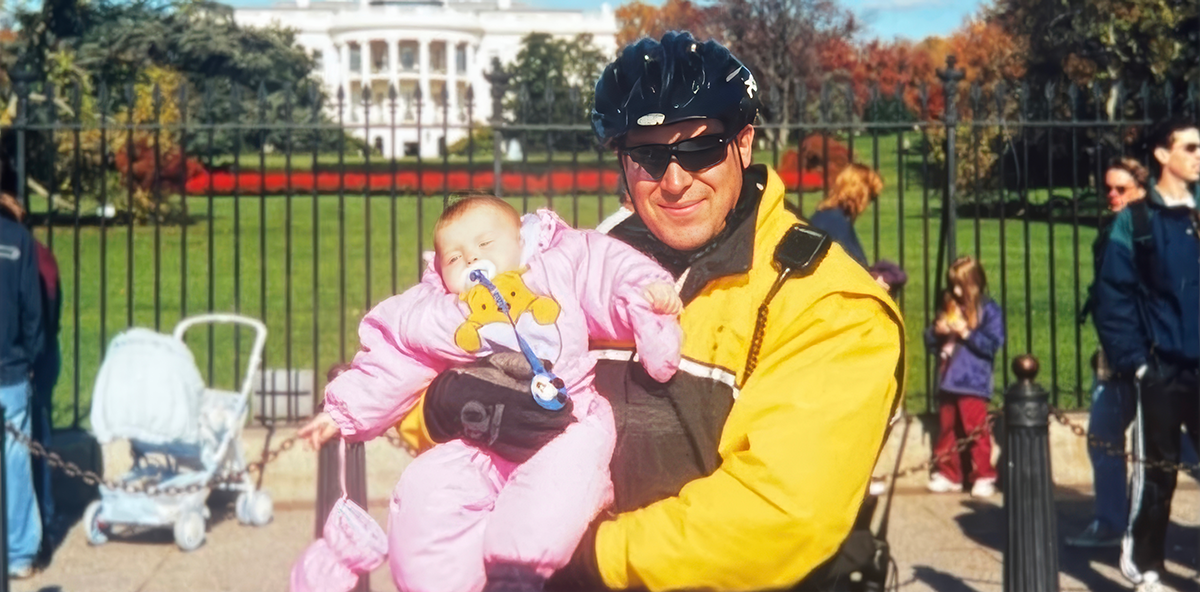 Officer Technician Joseph Vadala holds 3-month-old future Secret Service Officer Irina Lopez.