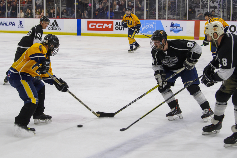 Secret Service and FBI at the annual charity hockey game. 