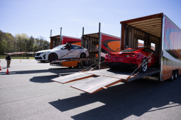 Cars being unloaded at James J. Rowley Training Center.