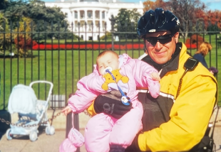 Officer Technician Joseph Vadala holds 3-month-old future Secret Service Officer Irina Lopez